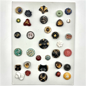 Card of 33 Italian and French ceramic buttons. 