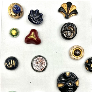 Card of 33 Italian and French ceramic buttons. 
