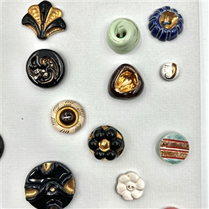 Card of 33 Italian and French ceramic buttons. 