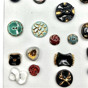 Card of 33 Italian and French ceramic buttons. 