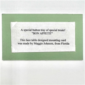 Framed card of 39 molded plastic buttons of pastries and deserts.