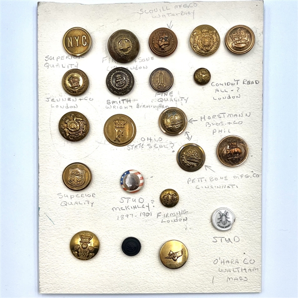 Card of 21 mostly uniform buttons.