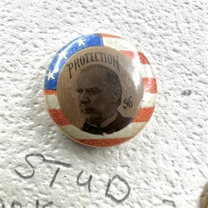Card of 21 mostly uniform buttons.