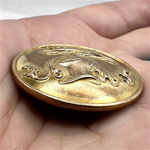 Livery crest button of a hare with helm or rank and mantle.