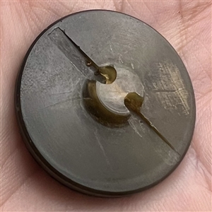Pressed horn sporting button of hunting objects.