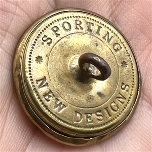 RARE sporting target button with pearl center.