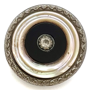 Sporting target button with four materials.