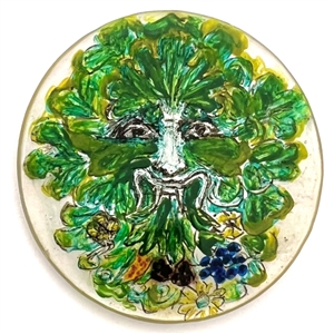 Painted pearl studio button of a Greenman.
