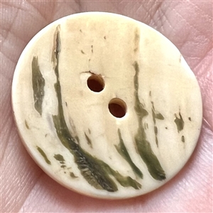 Incised and inked pearl Irish Claddagh button.