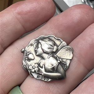 Art Nouveau Hallmarked silver button of a fairy with a strawberry. 