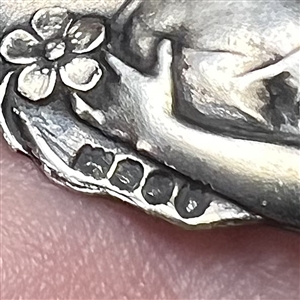 Art Nouveau Hallmarked silver button of a fairy with a strawberry. 