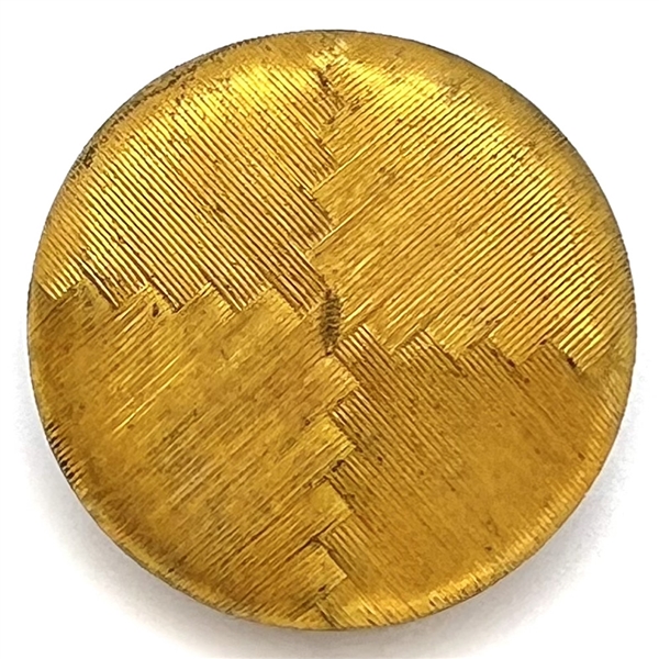 An 18th c. Deaths head button on natural material.