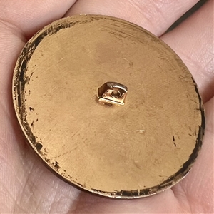 Greek Mythological aluminum button of Queen Nymph Eidyia being bathed.