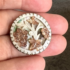A 19th c. Carved pearl button of grapes.