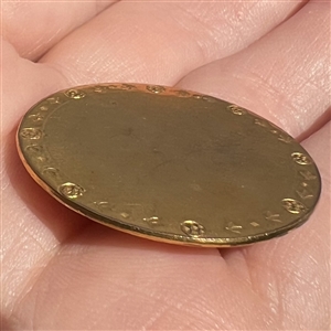 An 18th c. Copper Colonial button with chased border. 