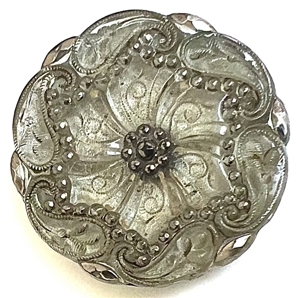 A 19th c. Lacy glass button of lovely paisley design. 