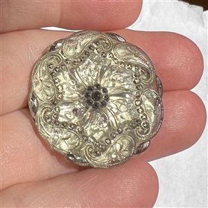 A 19th c. Lacy glass button of lovely paisley design. 