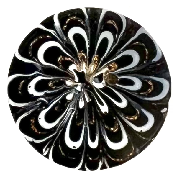 A 19th c. Black glass “Nailsea" button. 