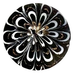 A 19th c. Black glass “Nailsea" button. 