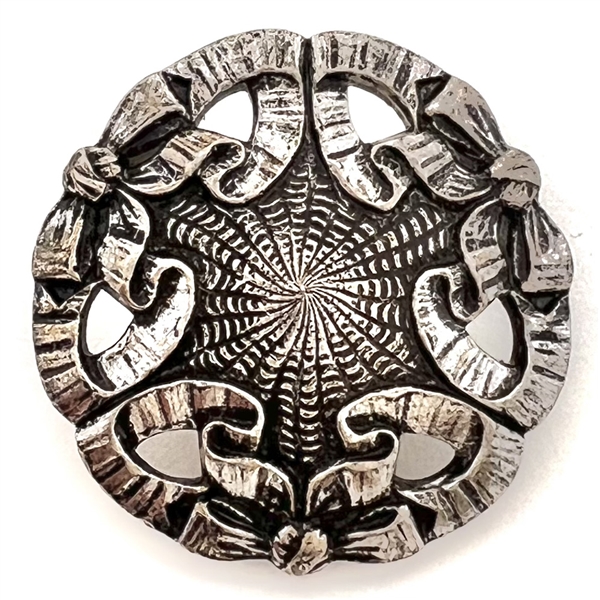 A 19th c. Silver (?) ribbons and bows  design button.