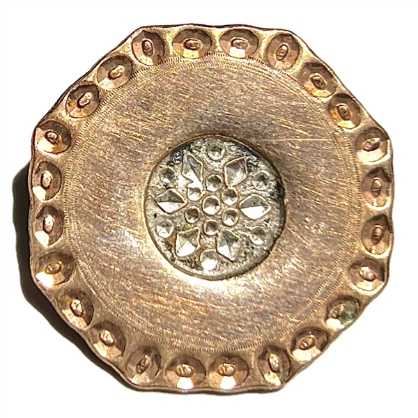 An 18th c. Copper Colonial button in a hexagon shape with chased border. 