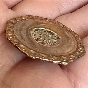 An 18th c. Copper Colonial button in a hexagon shape with chased border. 