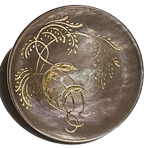 A 19th c. Incised pearl button of plant life. 
