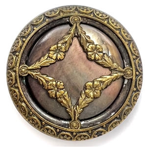A 19th c. pearl button set metal with garland.