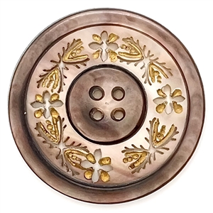 A 19th c. 4-hole pearl button of incised and pierced plant life.