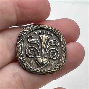 Bretagne folk design button of silvered metal.