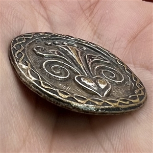 Bretagne folk design button of silvered metal.