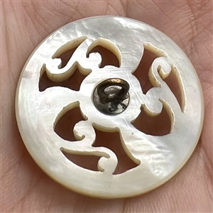 A 19th c. Carved pearl with open work and center star.
