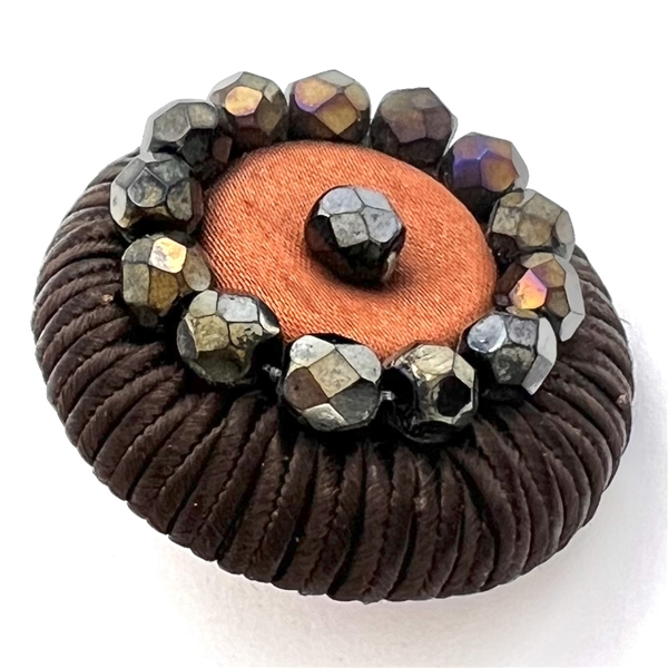 A 19th c. Fabric button with big faceted black glass beads.