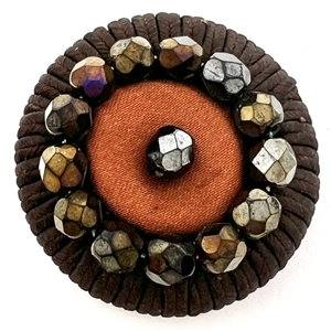 A 19th c. Fabric button with big faceted black glass beads.