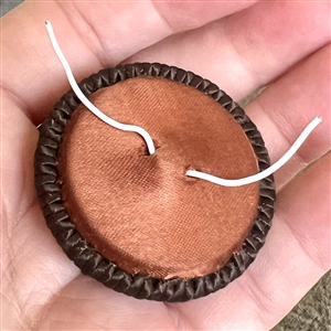 A 19th c. Fabric button with big faceted black glass beads.