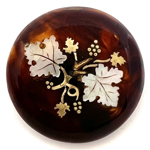 A 19th c. Tortoise button with abalone and metal inlay of grapes. 