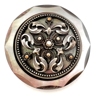 A 19th c. pearl button with silvered brass OME.