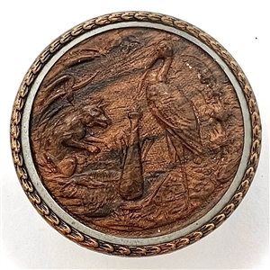 A 19th c. Fable button of fox and stork in molded wood.
