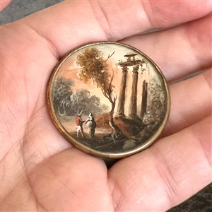 An 18th c. Painting under glass of a couple visiting ruins.