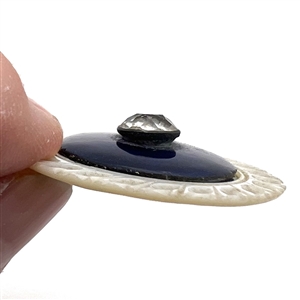 An 18th c. pearl with cobalt glass center and paste pin shank.