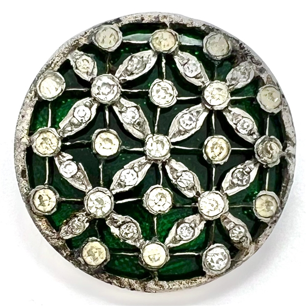 Beautiful open work with pastes over green glass set in metal.