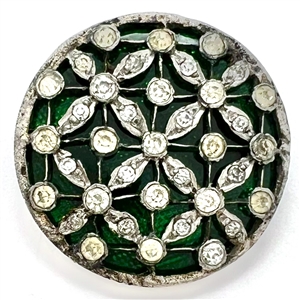 Beautiful open work with pastes over green glass set in metal.