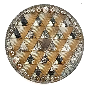 Lacy glass button of a pattern of triangles. 