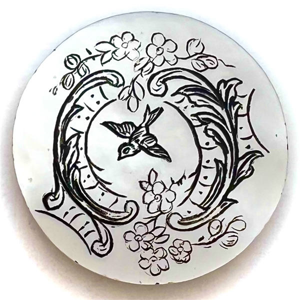 Late 19th c. Pearl button of a bird flying through a trestle.