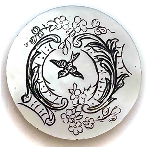Late 19th c. Pearl button of a bird flying through a trestle.