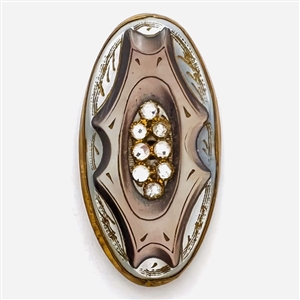 Late 19th c. Carved pearl button in metal with oval center of pastes. 