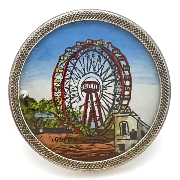 Painting under glass set in metal of “The Great Wheel." 