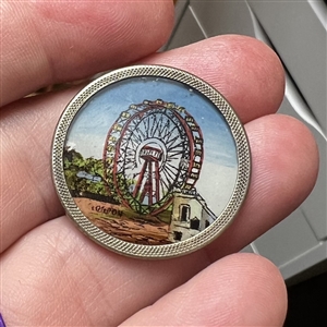 Painting under glass set in metal of “The Great Wheel. 