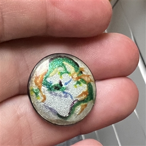 Japanese Gin bari foil enamel button of a green dragon set in silver.