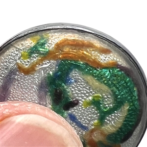 Japanese Gin bari foil enamel button of a green dragon set in silver.